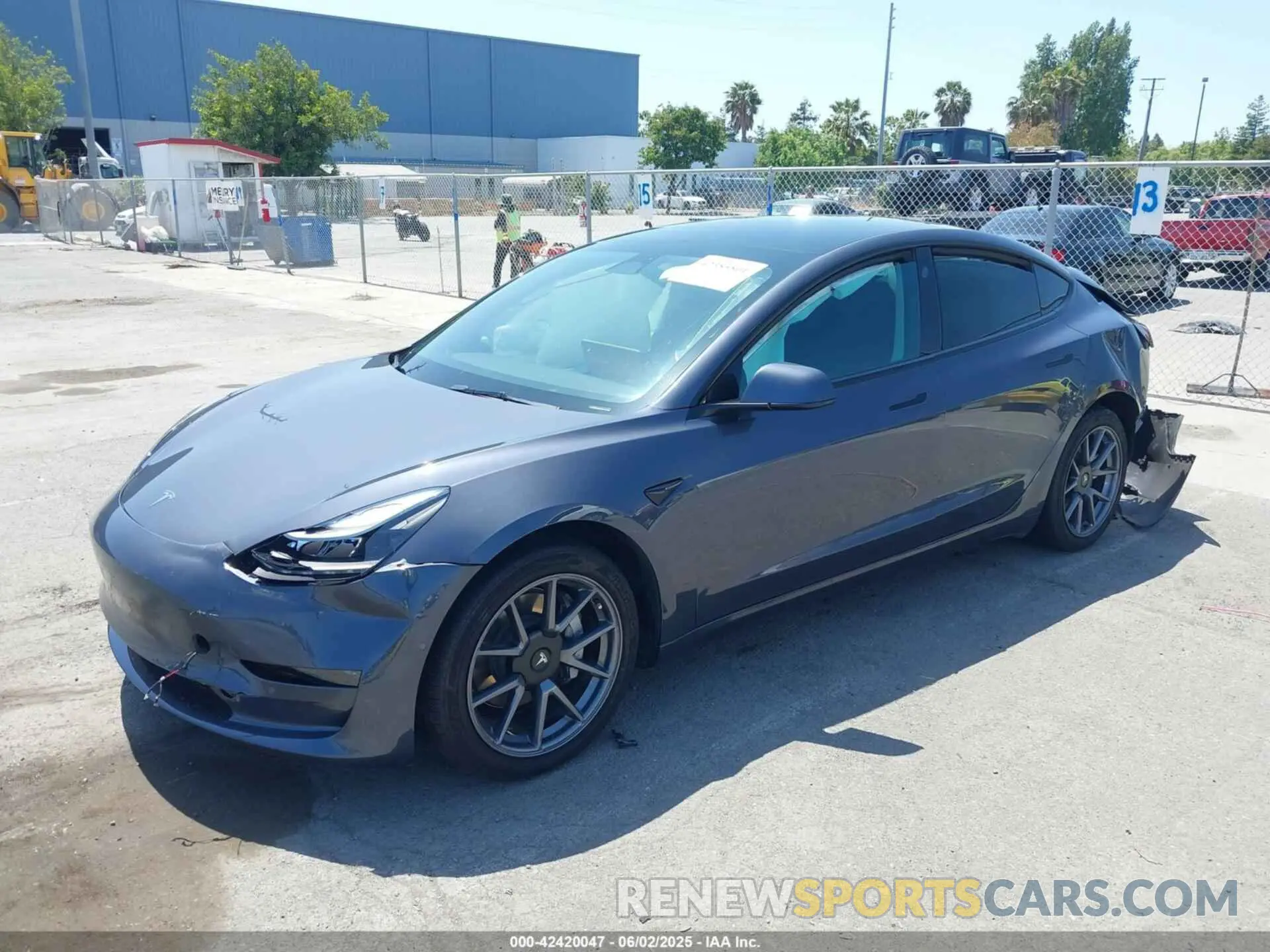 2 fotografías del automóvil dañado 5YJ3E1EB9NF363131 TESLA MODEL 3 2022