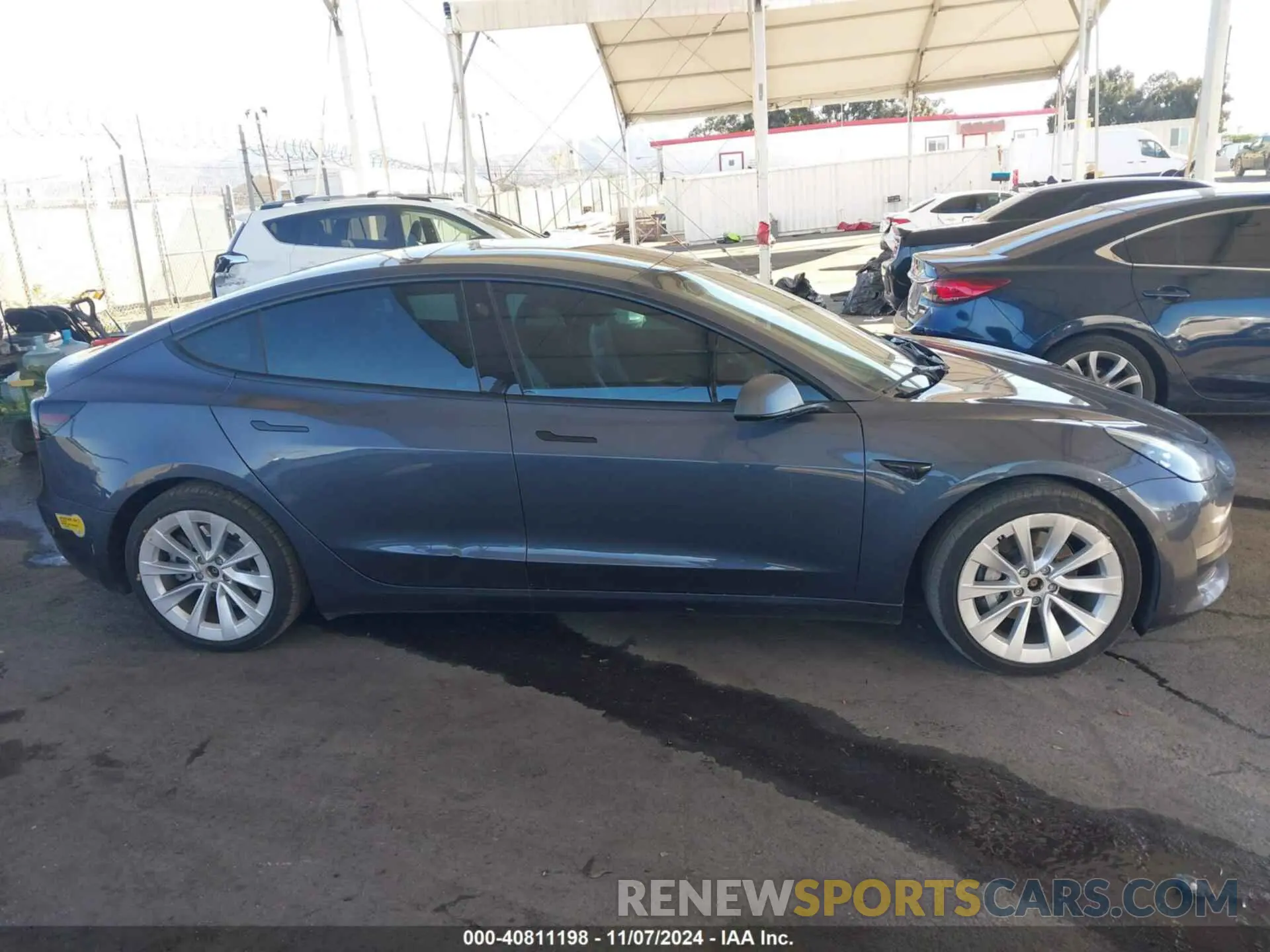 14 fotografías del automóvil dañado 5YJ3E1EBXNF124073 TESLA MODEL 3 2022