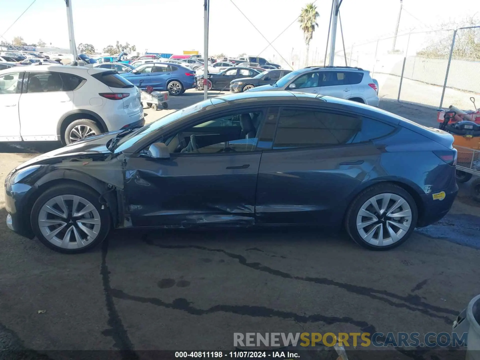 15 fotografías del automóvil dañado 5YJ3E1EBXNF124073 TESLA MODEL 3 2022