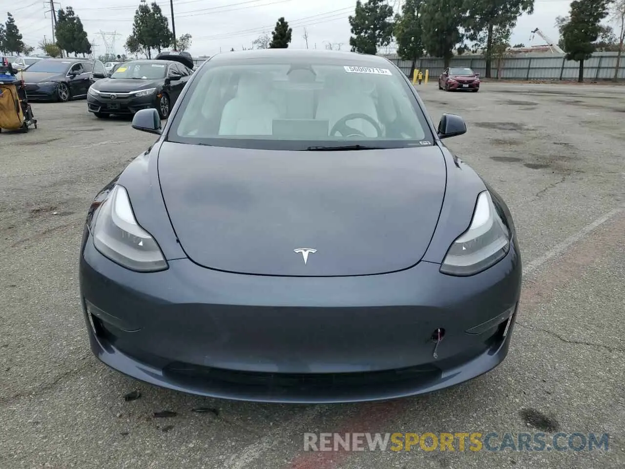 5 fotografías del automóvil dañado 5YJ3E1EBXNF166128 TESLA MODEL 3 2022