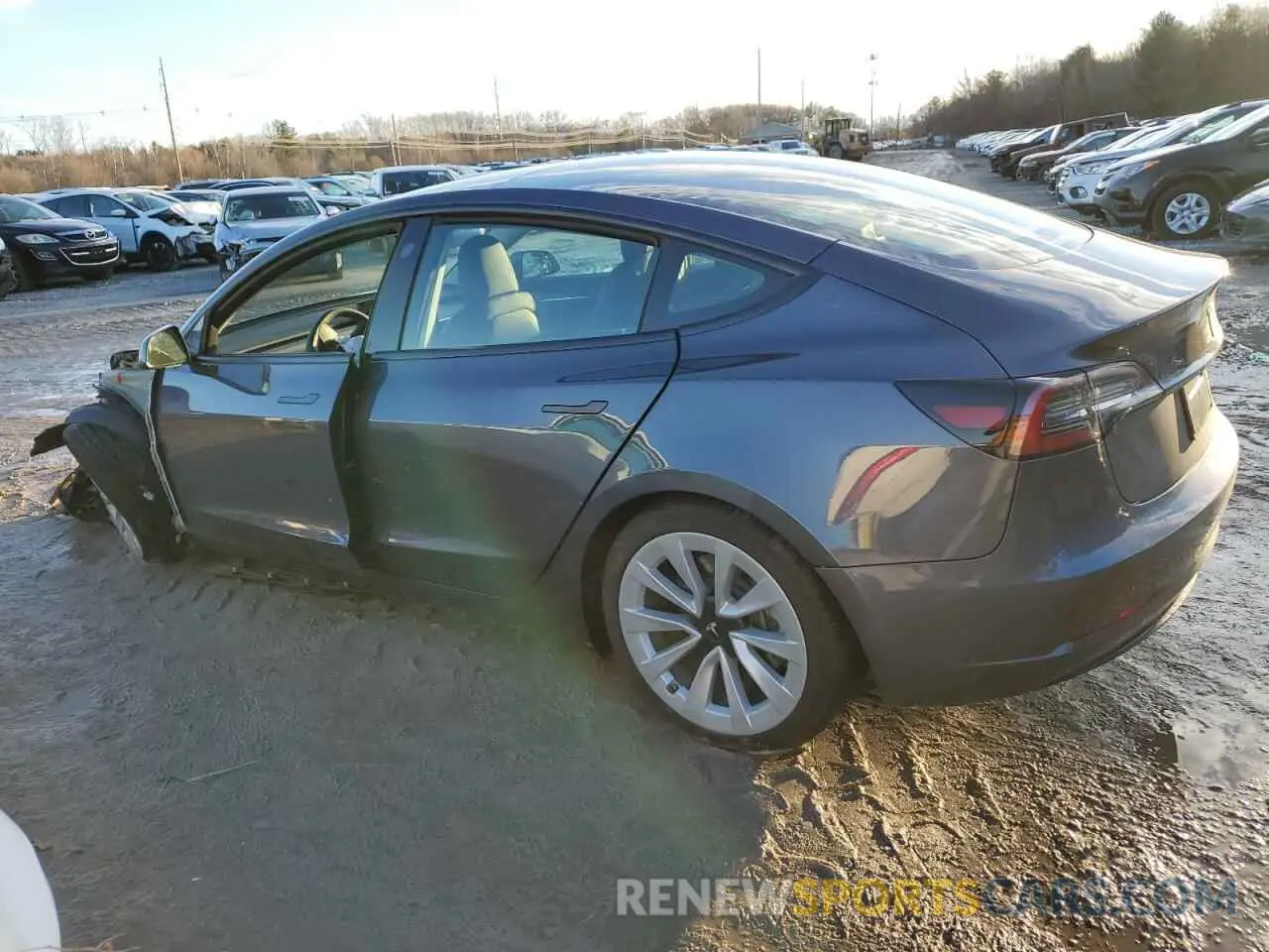 2 fotografías del automóvil dañado 5YJ3E1EBXNF201430 TESLA MODEL 3 2022