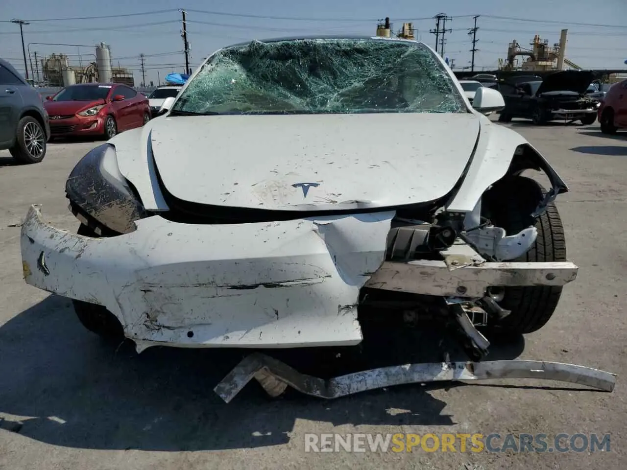 5 fotografías del automóvil dañado 5YJ3E1EBXNF211018 TESLA MODEL 3 2022