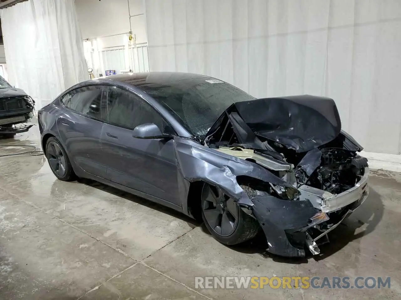 4 fotografías del automóvil dañado 5YJ3E1EBXNF249798 TESLA MODEL 3 2022