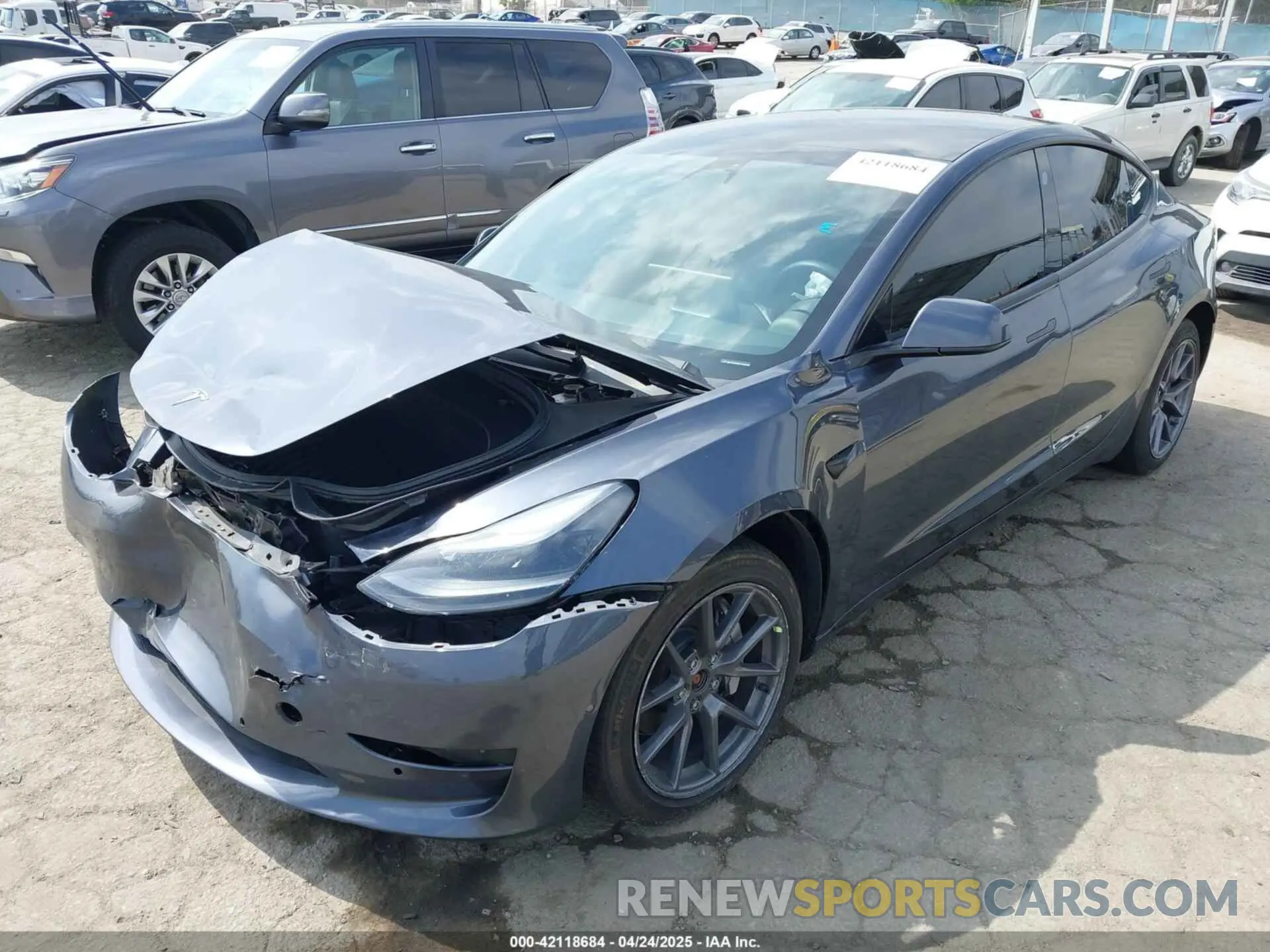 2 fotografías del automóvil dañado 5YJ3E1EBXNF250840 TESLA MODEL 3 2022
