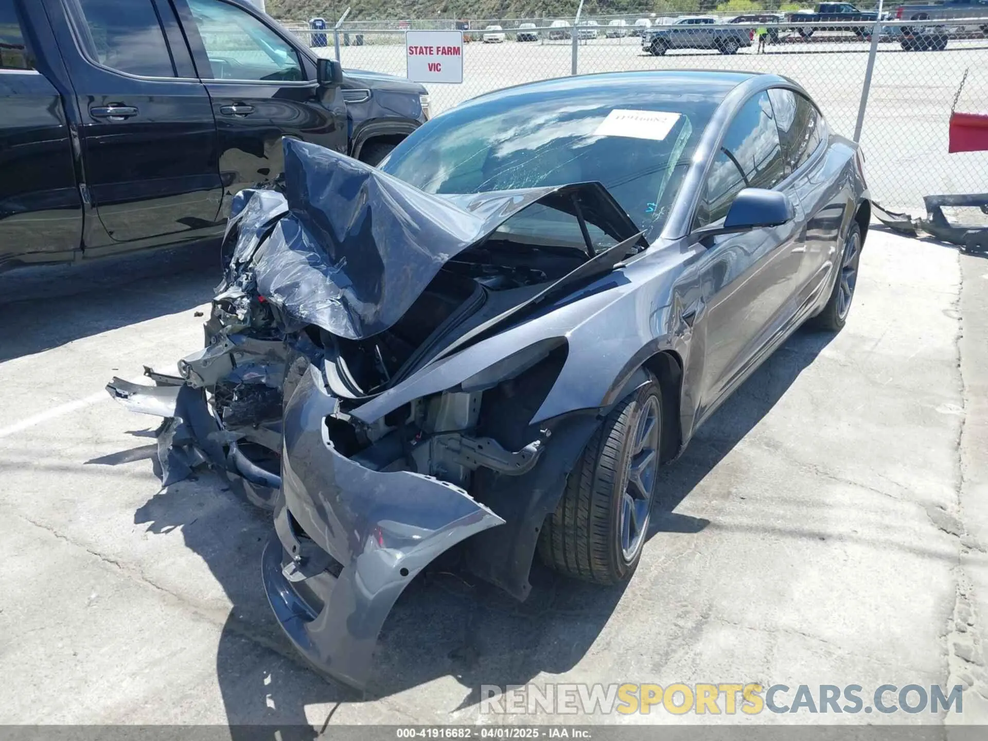 2 fotografías del automóvil dañado 5YJ3E1EBXNF311815 TESLA MODEL 3 2022