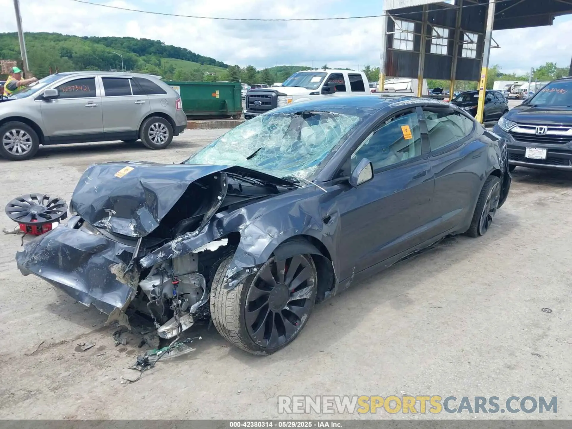 2 fotografías del automóvil dañado 5YJ3E1EC0NF174232 TESLA MODEL 3 2022