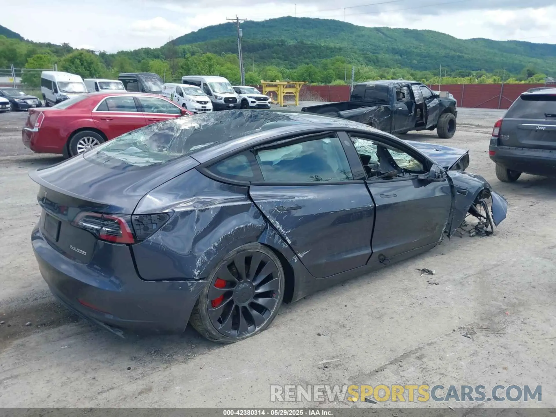 4 fotografías del automóvil dañado 5YJ3E1EC0NF174232 TESLA MODEL 3 2022