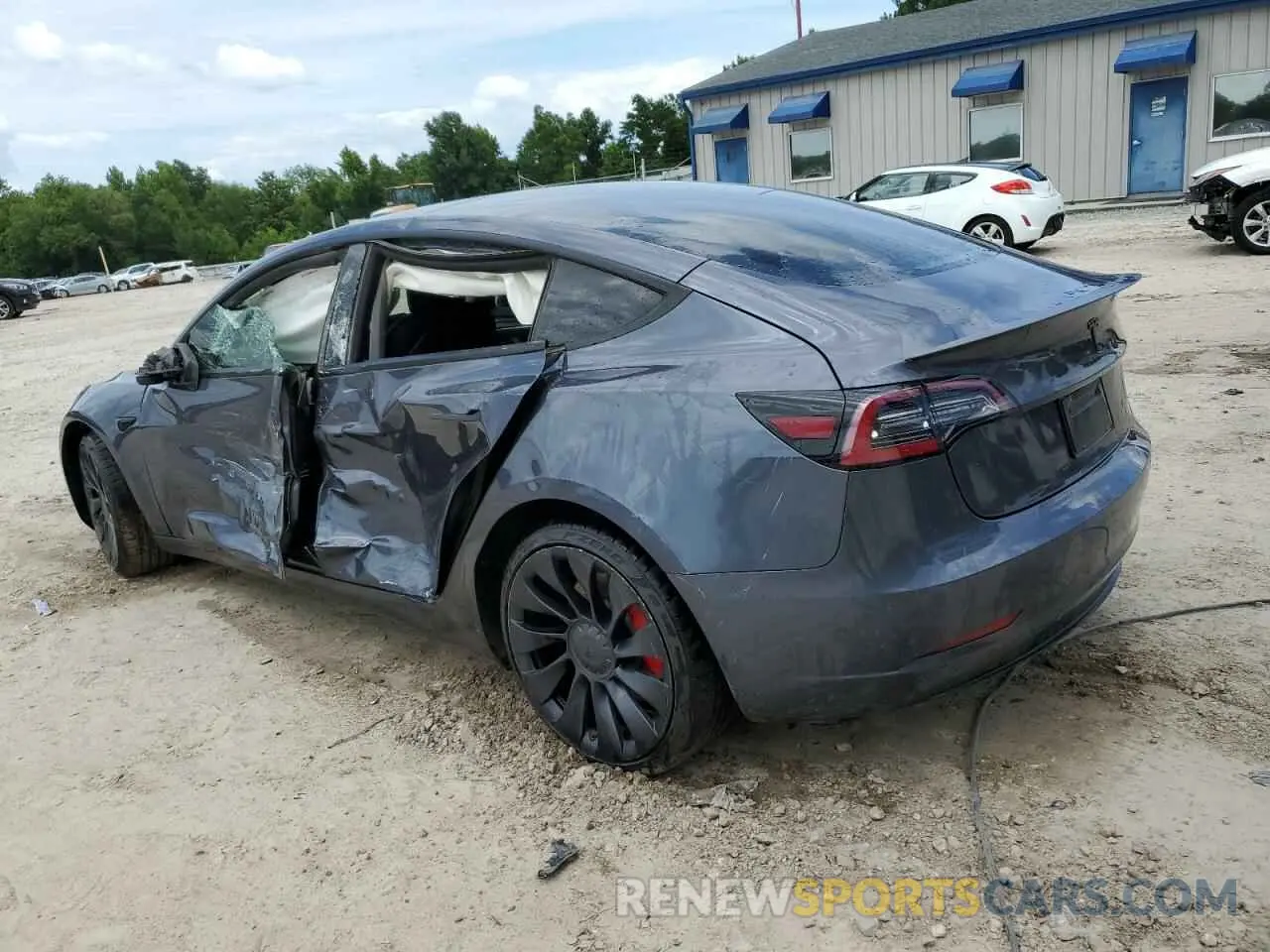 2 fotografías del automóvil dañado 5YJ3E1EC0NF261869 TESLA MODEL 3 2022