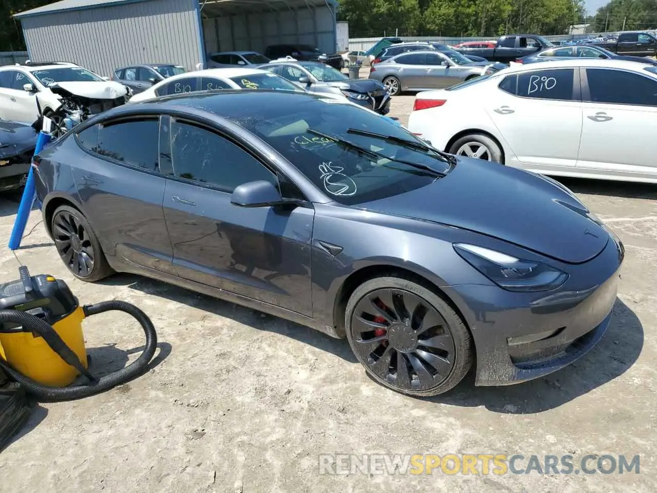 4 fotografías del automóvil dañado 5YJ3E1EC0NF261869 TESLA MODEL 3 2022