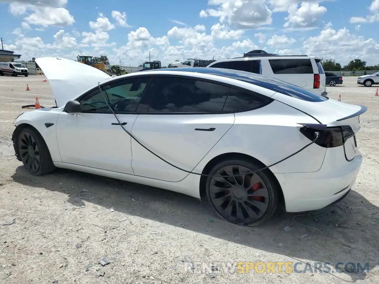 2 fotografías del automóvil dañado 5YJ3E1EC0NF314795 TESLA MODEL 3 2022