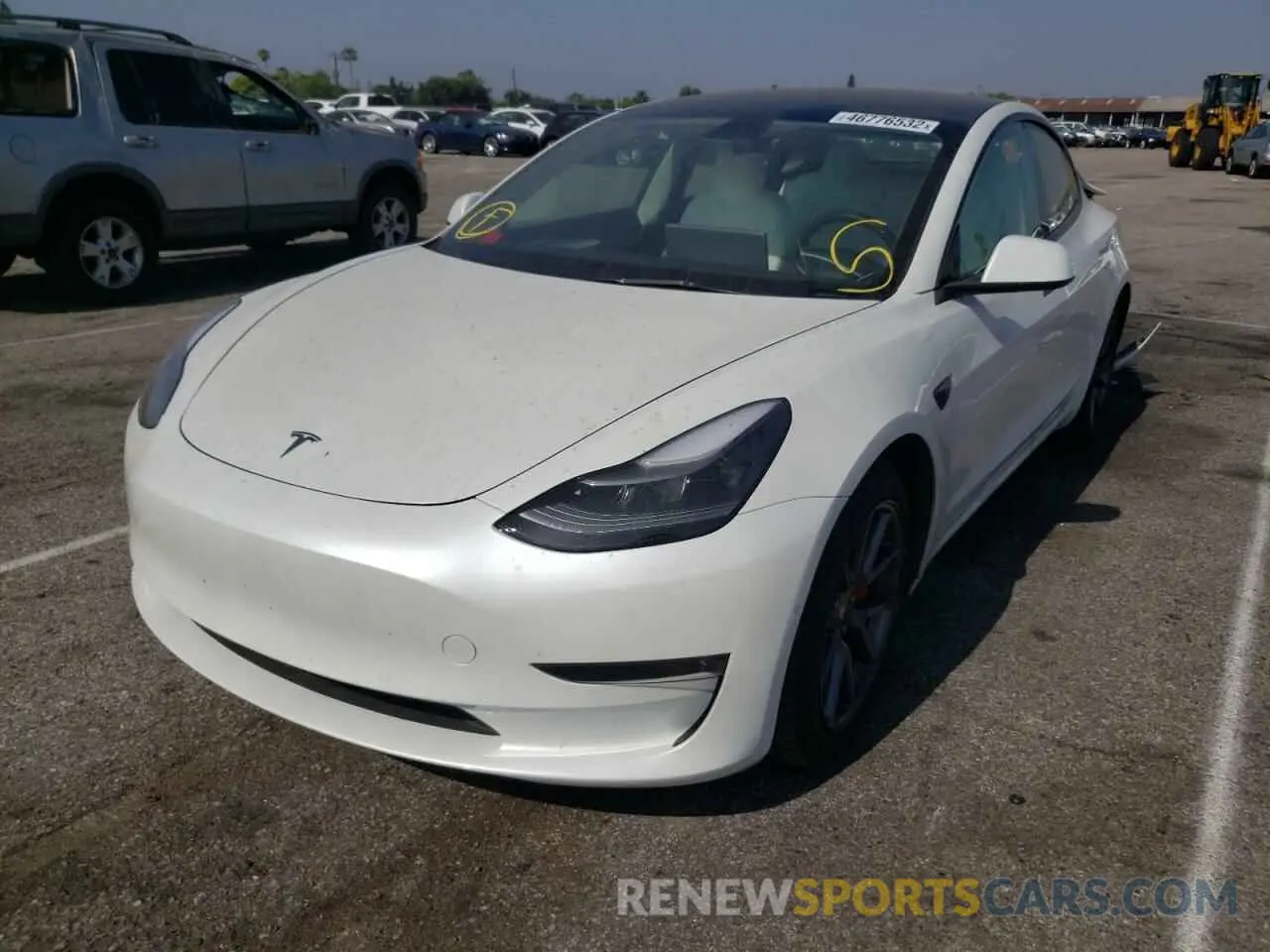 2 fotografías del automóvil dañado 5YJ3E1EC1NF131406 TESLA MODEL 3 2022
