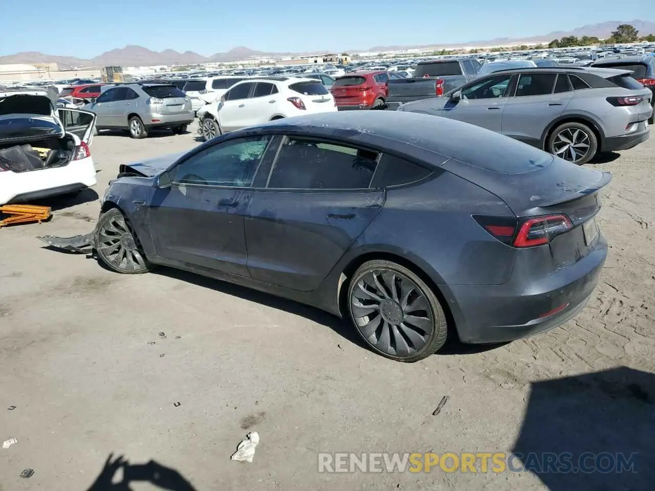 2 fotografías del automóvil dañado 5YJ3E1EC1NF154359 TESLA MODEL 3 2022
