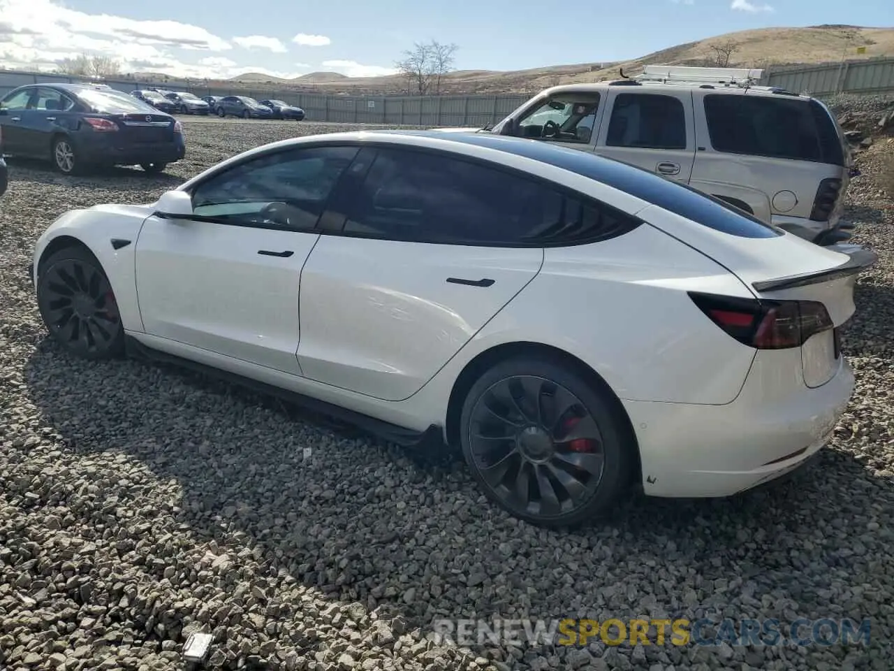 2 fotografías del automóvil dañado 5YJ3E1EC1NF243316 TESLA MODEL 3 2022