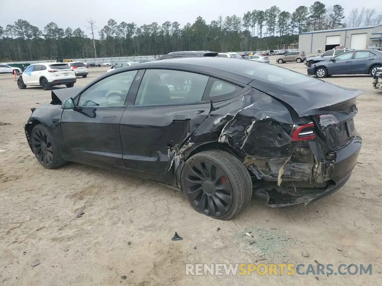 2 fotografías del automóvil dañado 5YJ3E1EC1NF267857 TESLA MODEL 3 2022