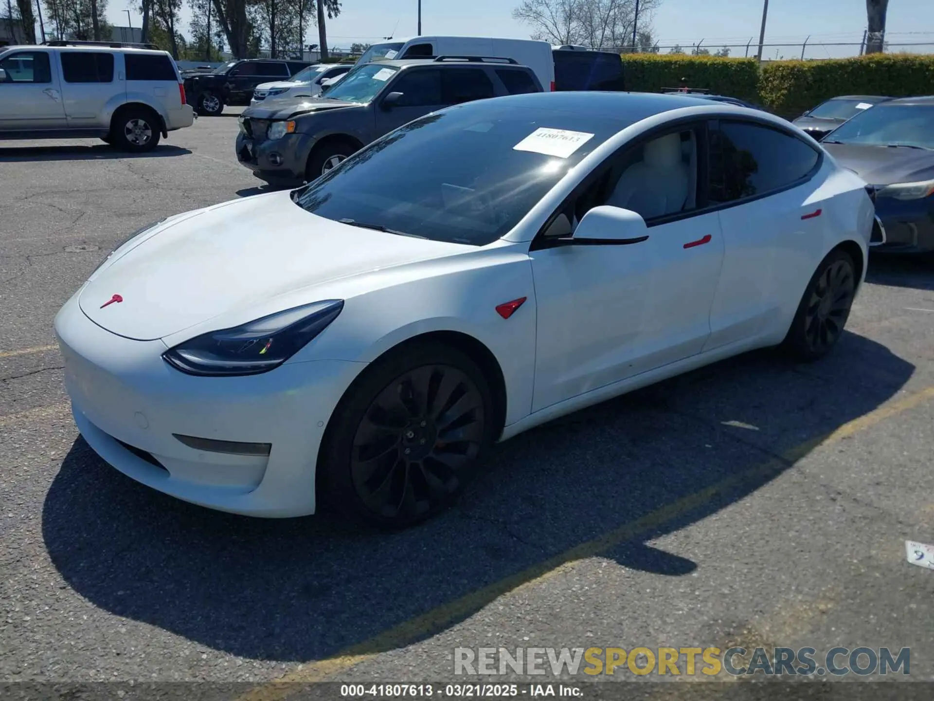 2 fotografías del automóvil dañado 5YJ3E1EC2NF176127 TESLA MODEL 3 2022