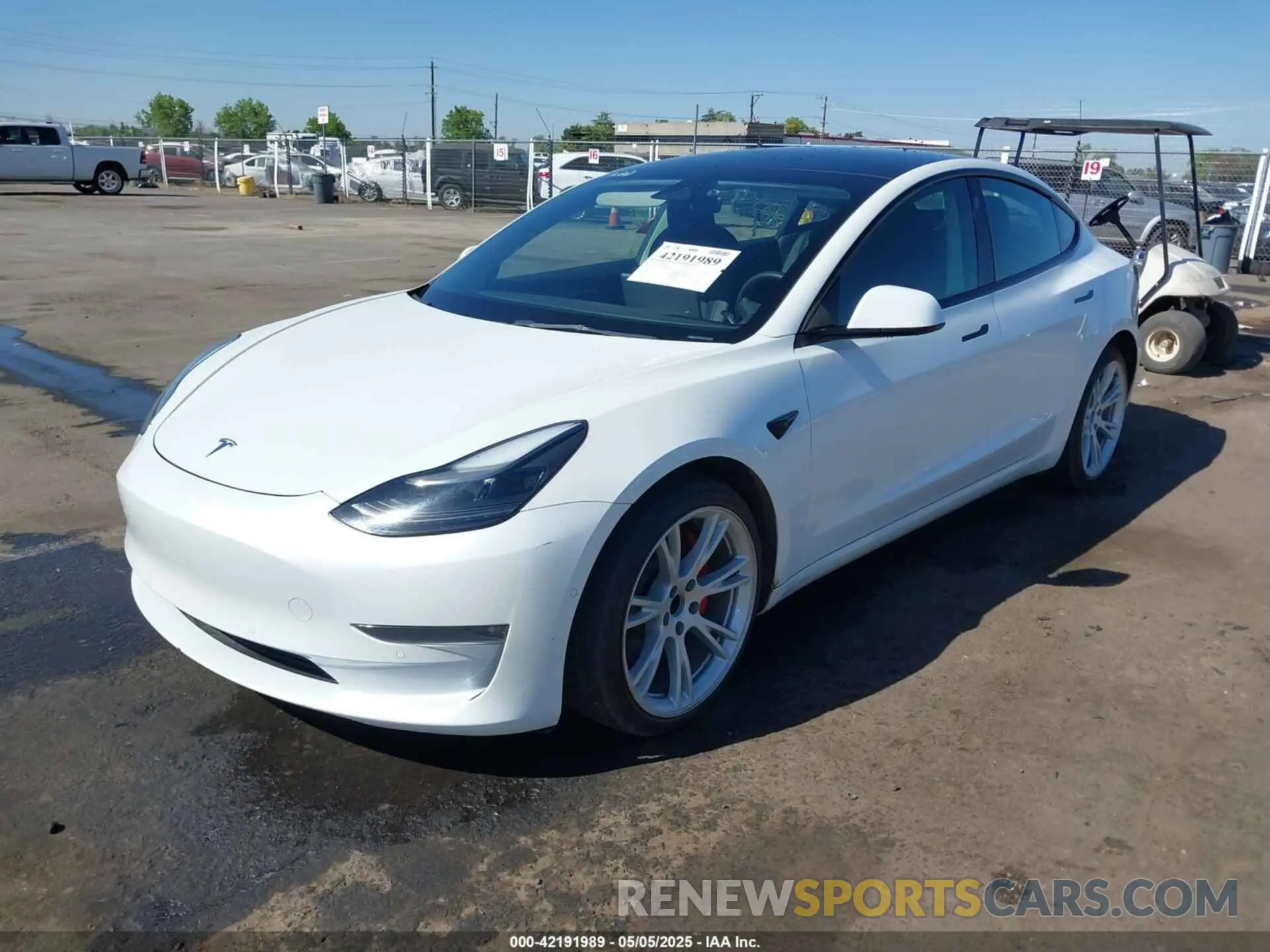 2 fotografías del automóvil dañado 5YJ3E1EC2NF270198 TESLA MODEL 3 2022
