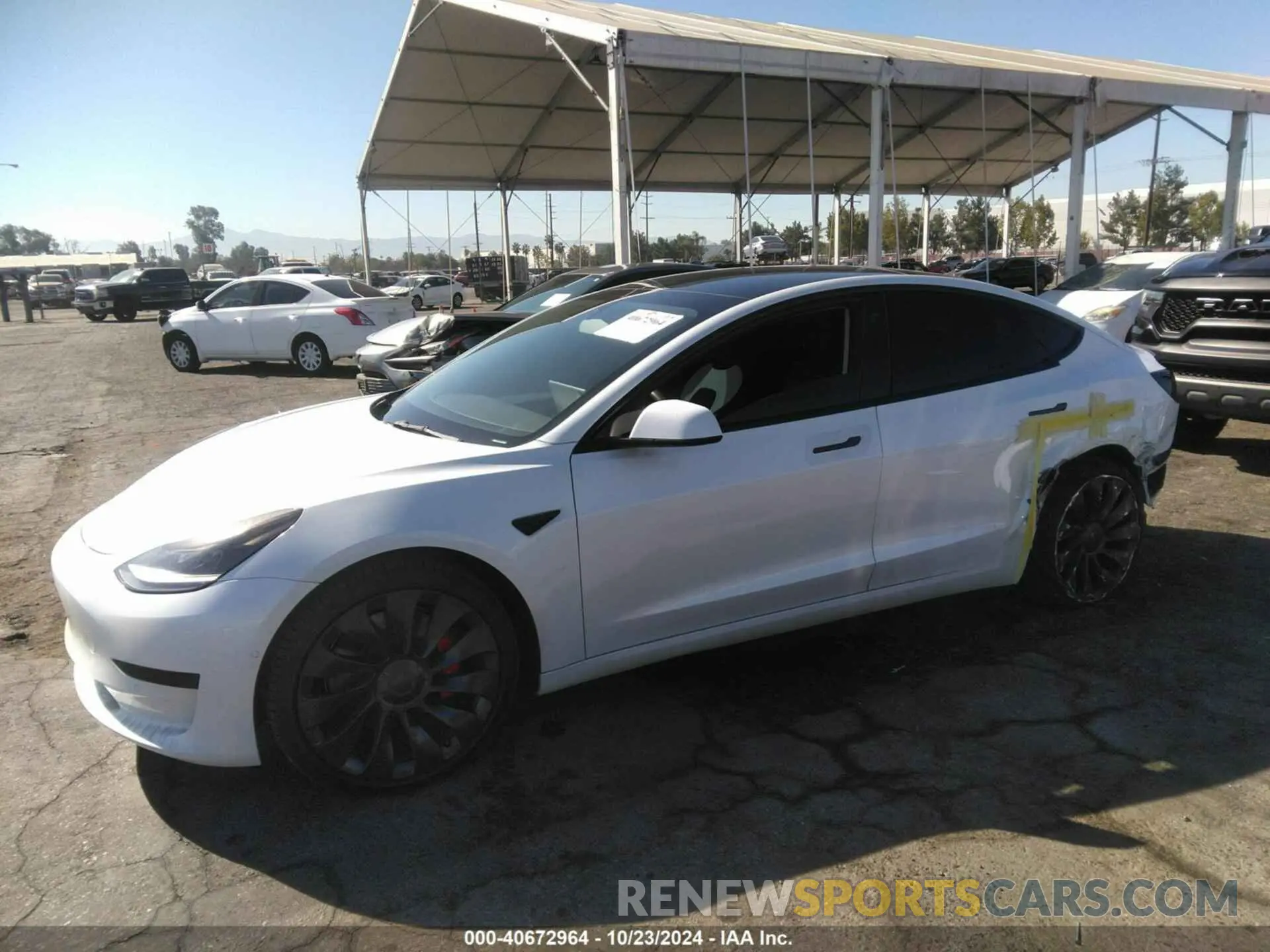 2 fotografías del automóvil dañado 5YJ3E1EC2NF275577 TESLA MODEL 3 2022