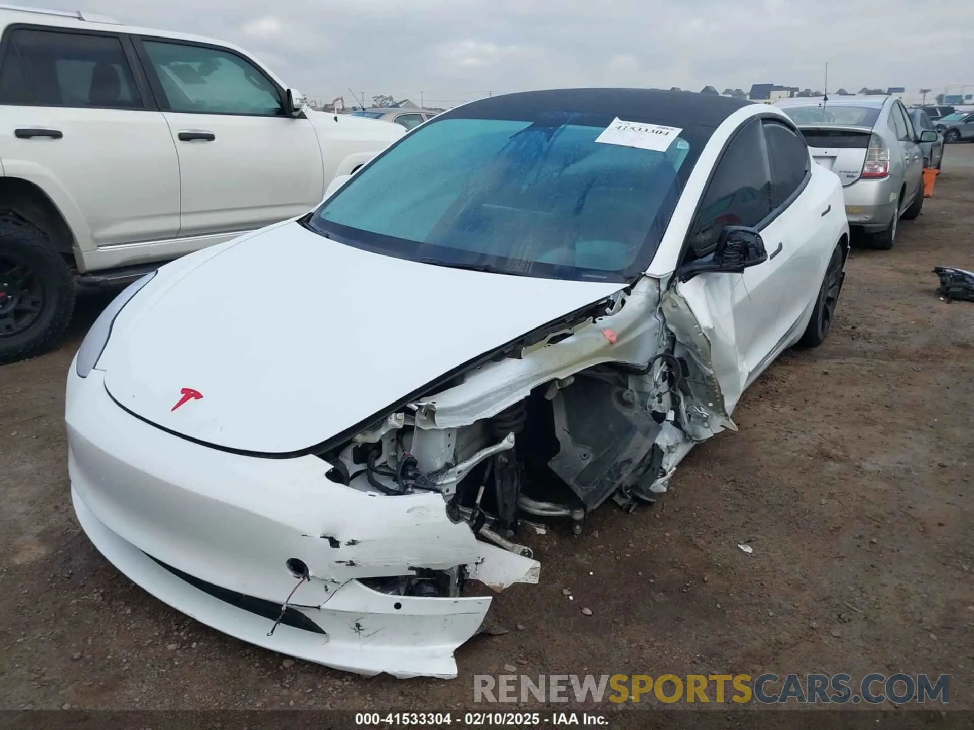 2 fotografías del automóvil dañado 5YJ3E1EC2NF295330 TESLA MODEL 3 2022