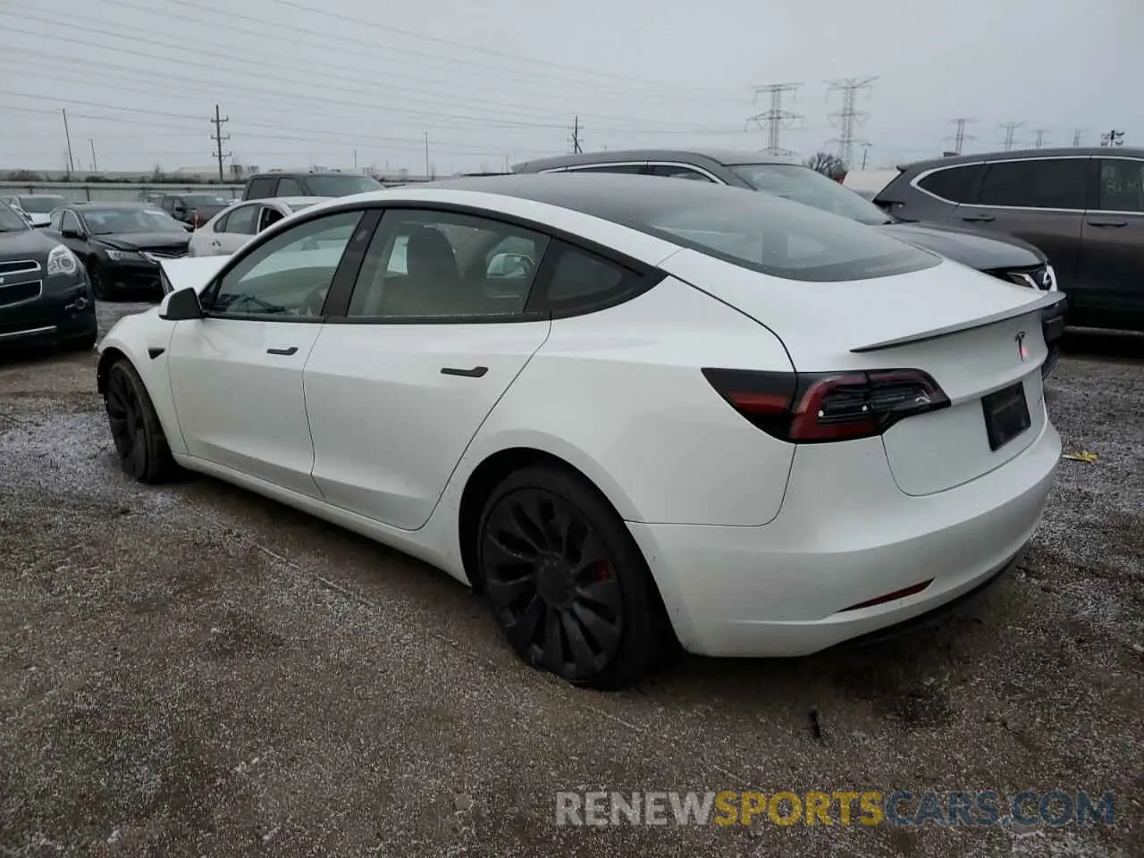2 fotografías del automóvil dañado 5YJ3E1EC2NF343103 TESLA MODEL 3 2022