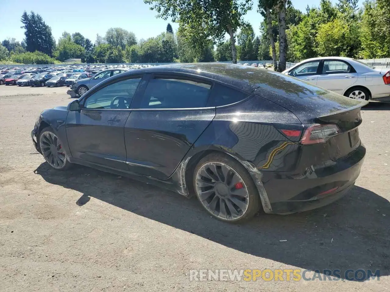 2 fotografías del automóvil dañado 5YJ3E1EC2NF357809 TESLA MODEL 3 2022