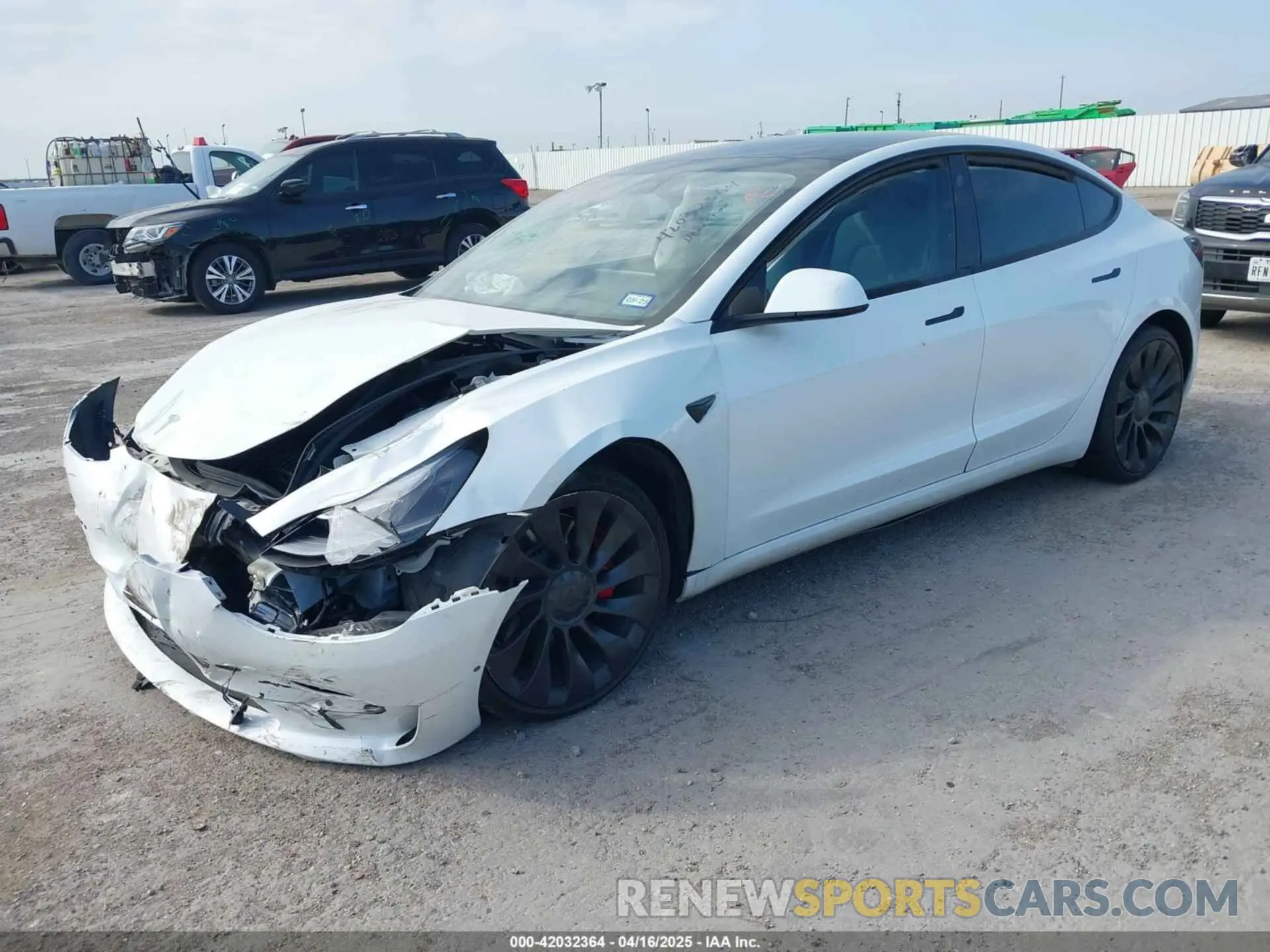 2 fotografías del automóvil dañado 5YJ3E1EC4NF134624 TESLA MODEL 3 2022