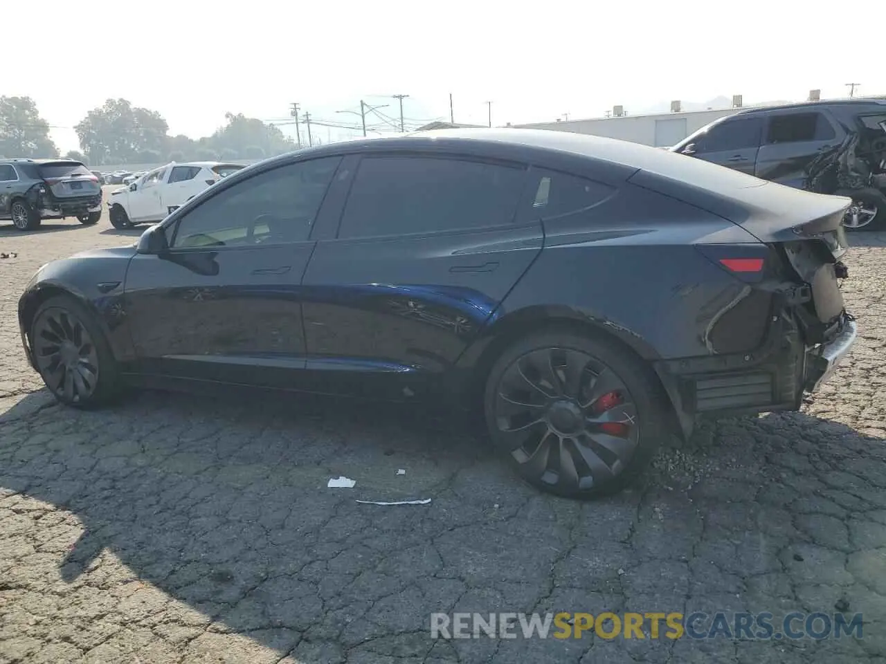 2 fotografías del automóvil dañado 5YJ3E1EC4NF209306 TESLA MODEL 3 2022