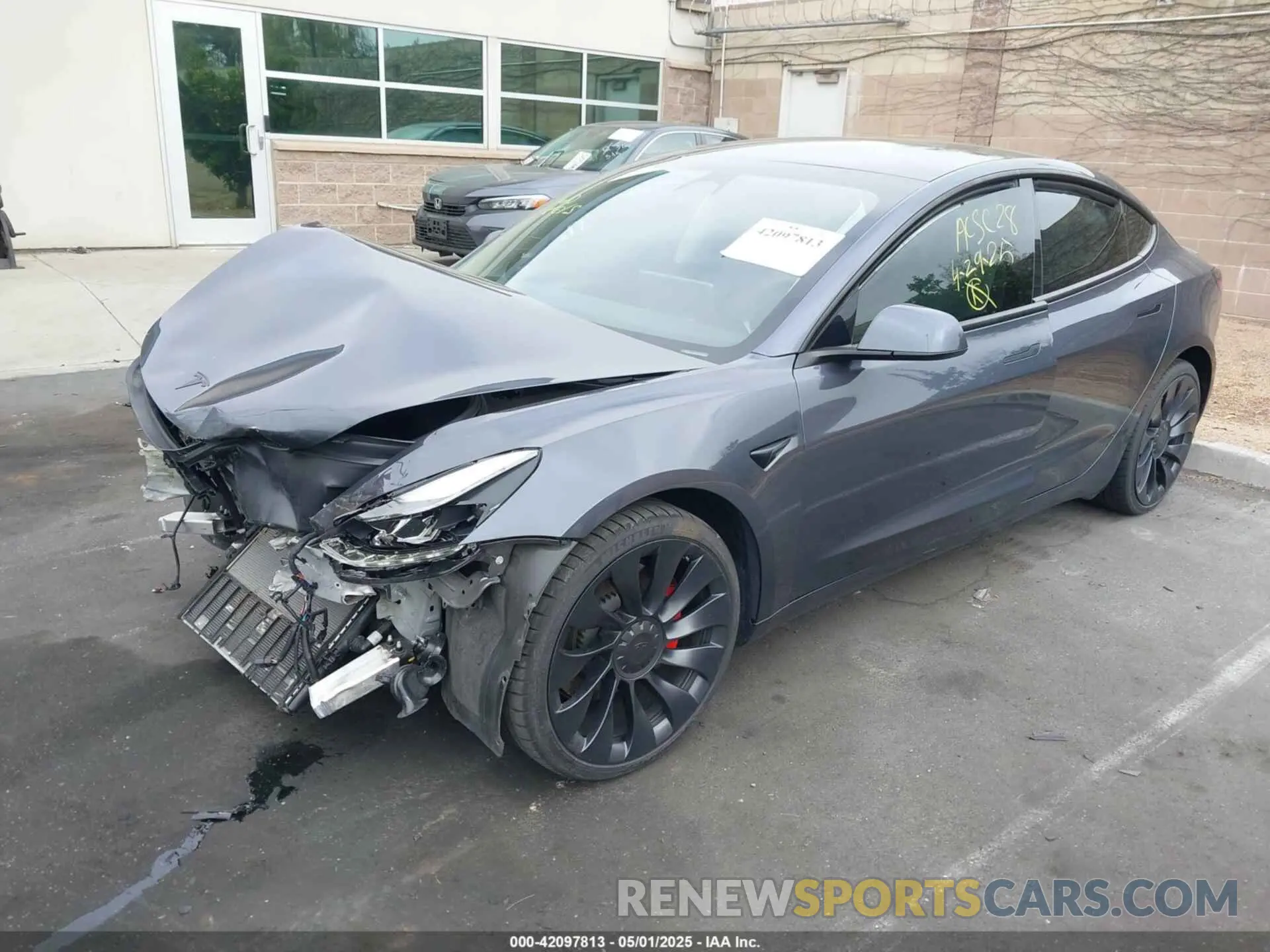 2 fotografías del automóvil dañado 5YJ3E1EC4NF258974 TESLA MODEL 3 2022