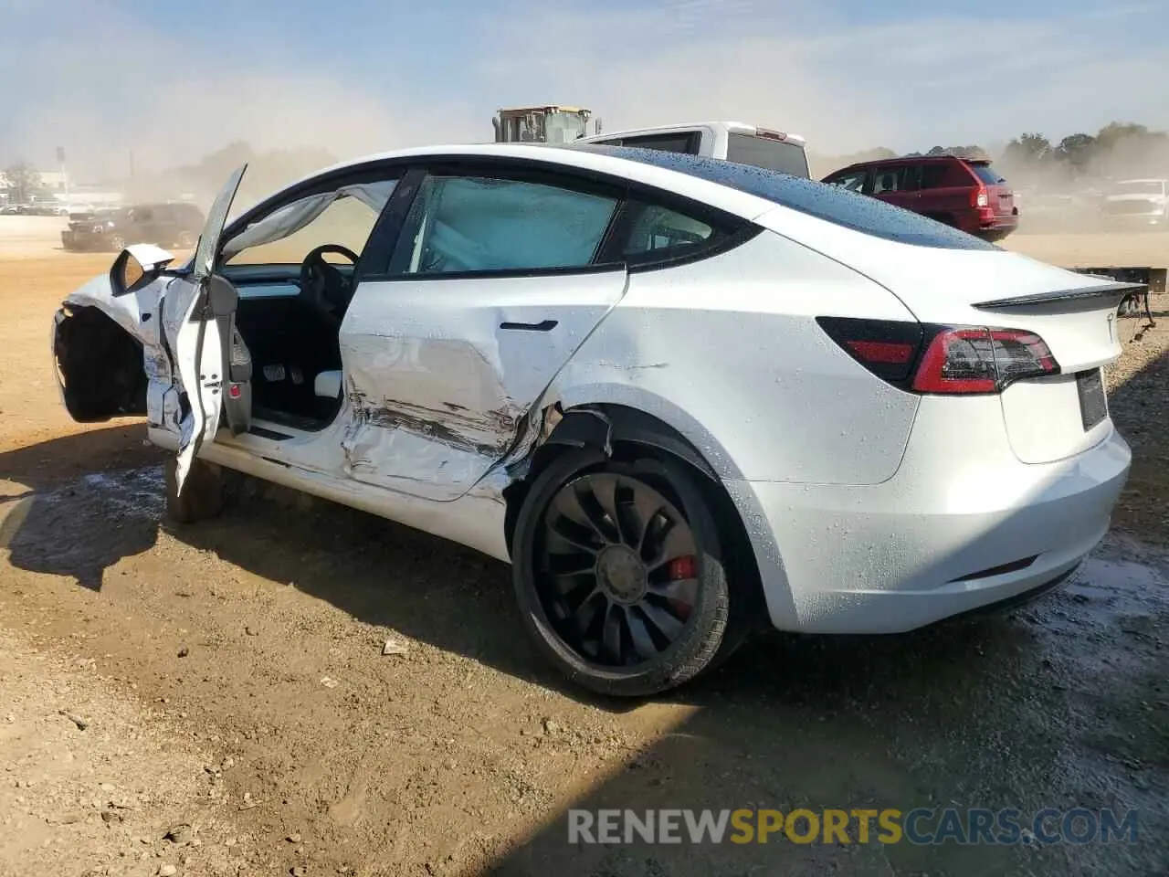 2 fotografías del automóvil dañado 5YJ3E1EC4NF269389 TESLA MODEL 3 2022