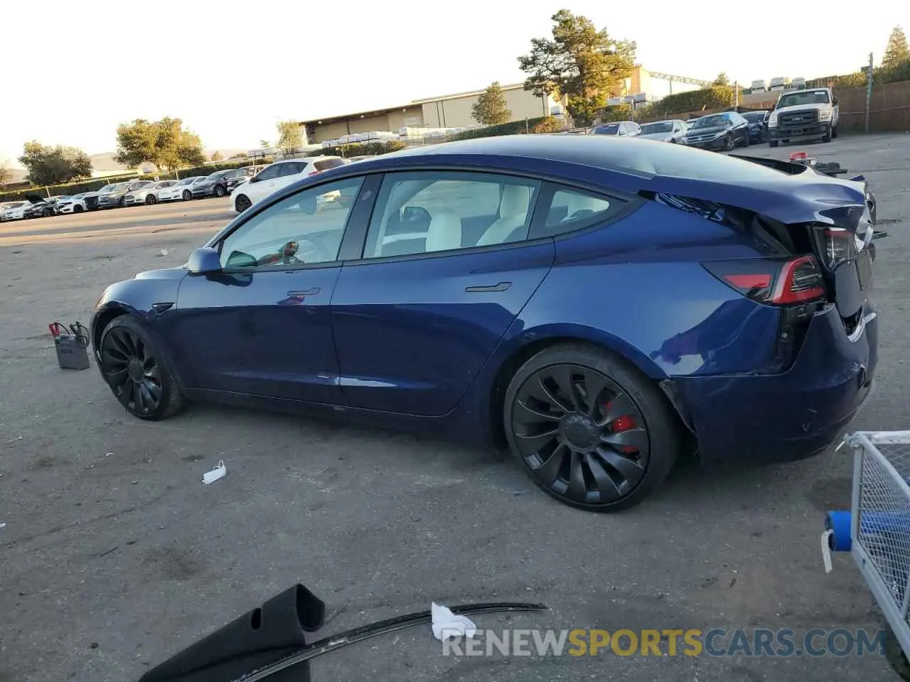 2 fotografías del automóvil dañado 5YJ3E1EC5NF159709 TESLA MODEL 3 2022