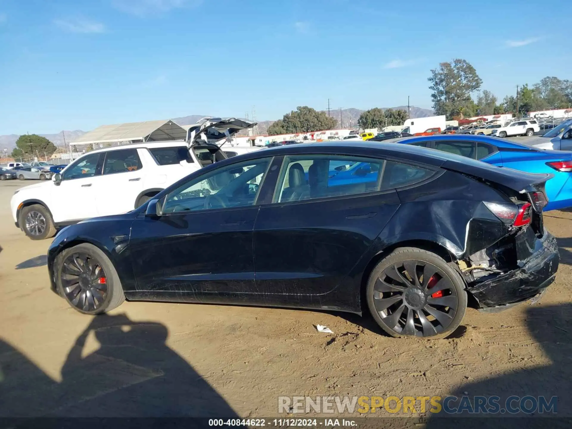13 fotografías del automóvil dañado 5YJ3E1EC5NF261155 TESLA MODEL 3 2022