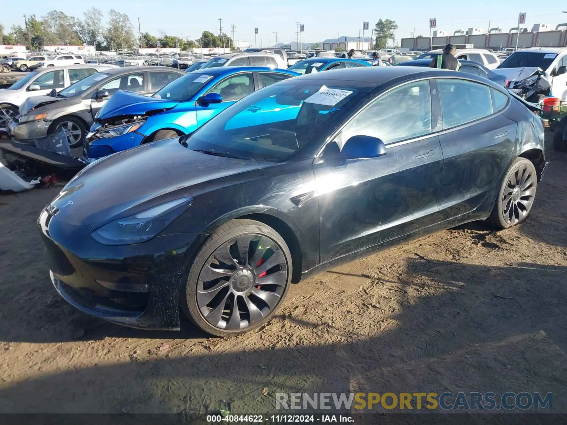 2 fotografías del automóvil dañado 5YJ3E1EC5NF261155 TESLA MODEL 3 2022