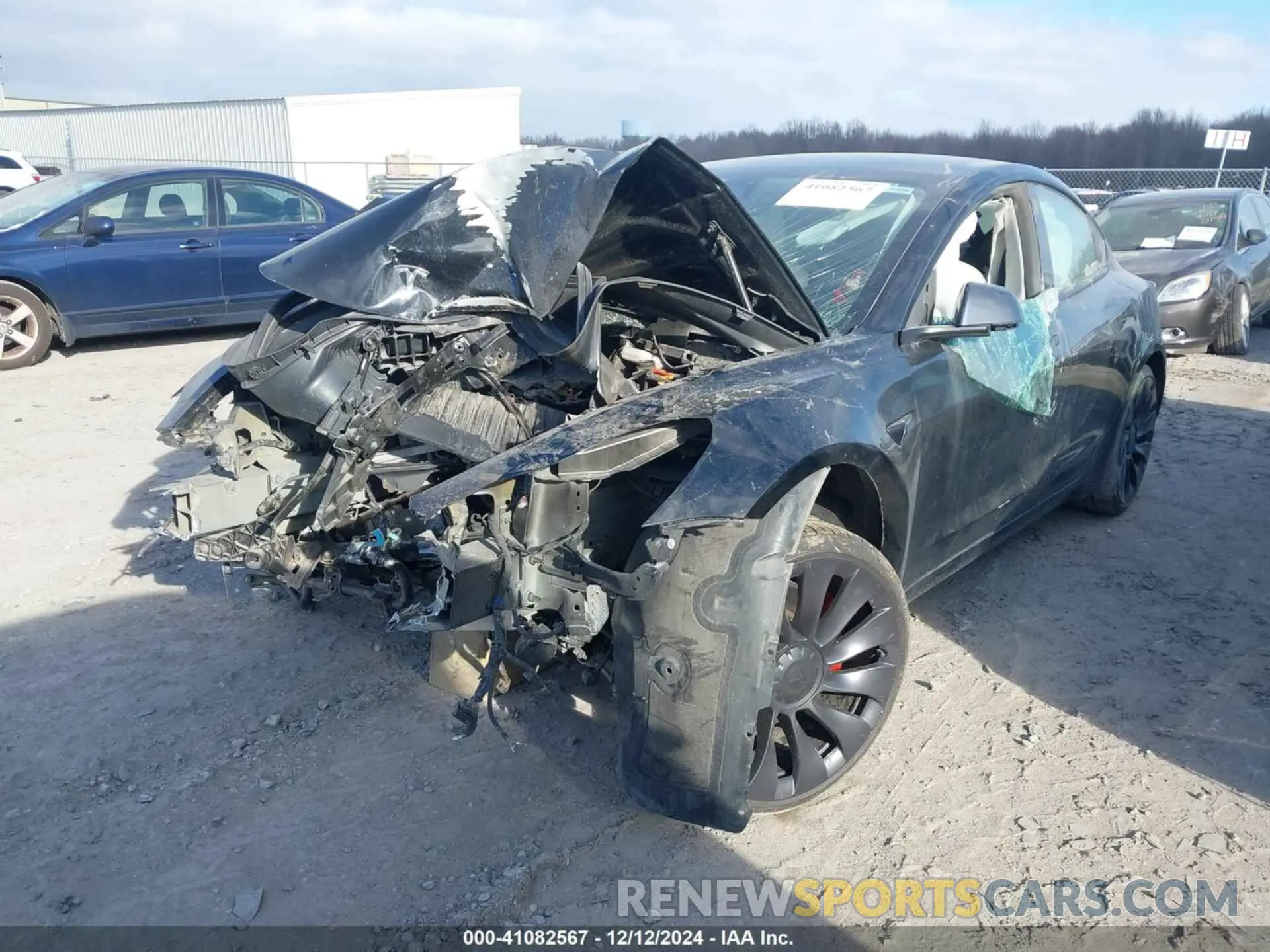 2 fotografías del automóvil dañado 5YJ3E1EC6NF112642 TESLA MODEL 3 2022
