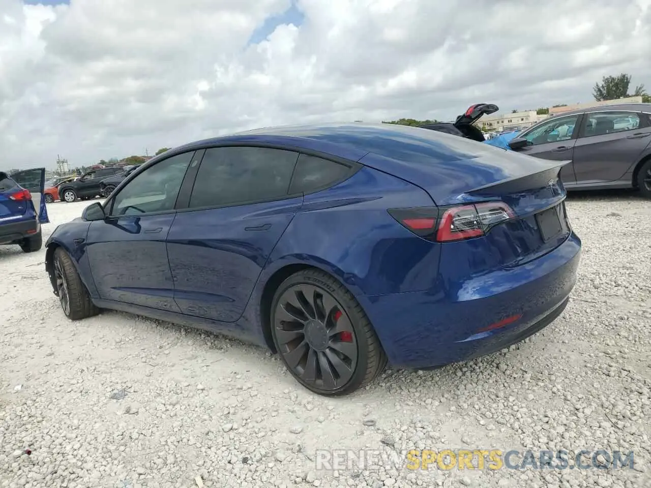 2 fotografías del automóvil dañado 5YJ3E1EC6NF254487 TESLA MODEL 3 2022