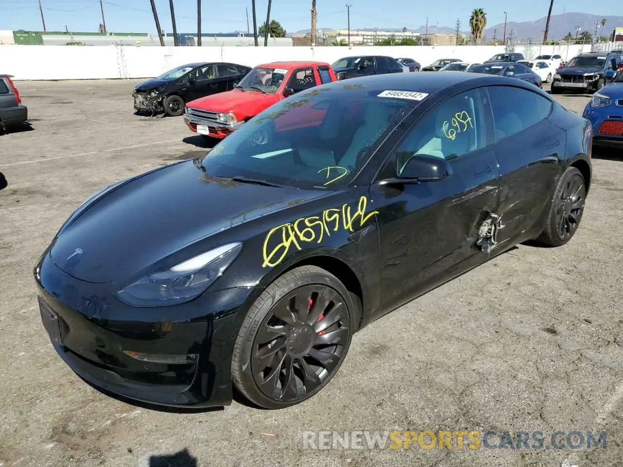 2 fotografías del automóvil dañado 5YJ3E1EC6NF265750 TESLA MODEL 3 2022