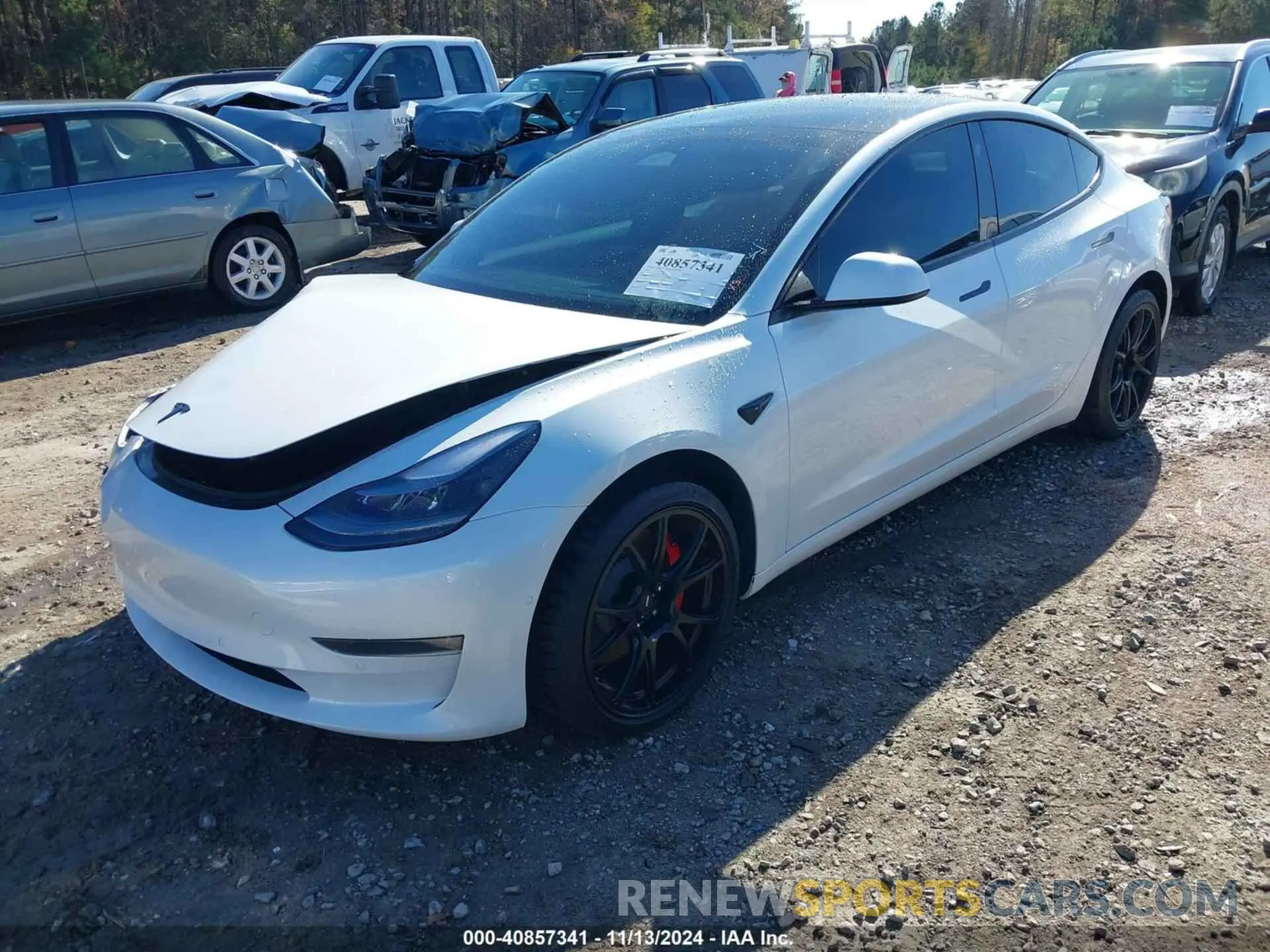 2 fotografías del automóvil dañado 5YJ3E1EC6NF342892 TESLA MODEL 3 2022