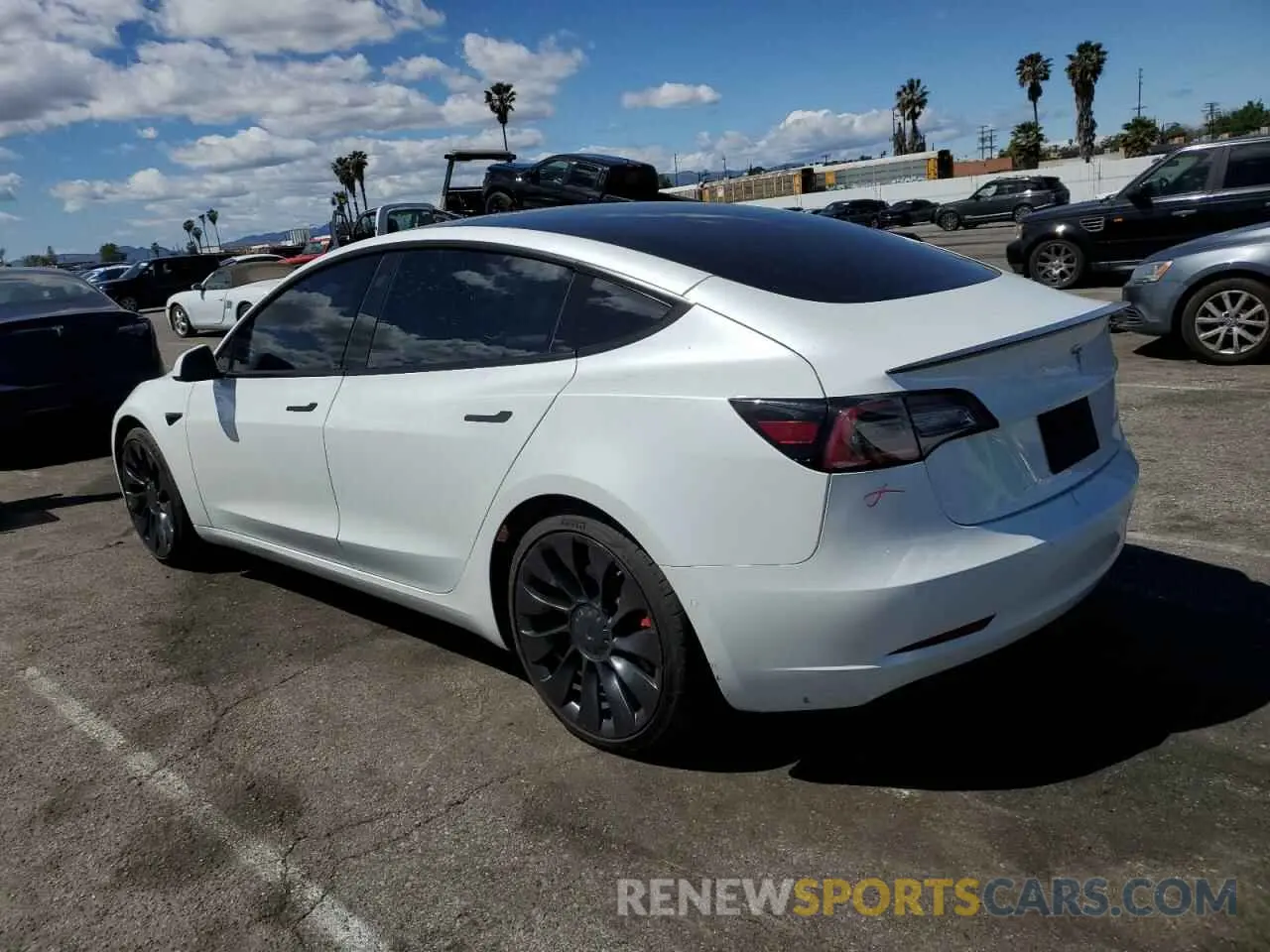 2 fotografías del automóvil dañado 5YJ3E1EC7NF248083 TESLA MODEL 3 2022