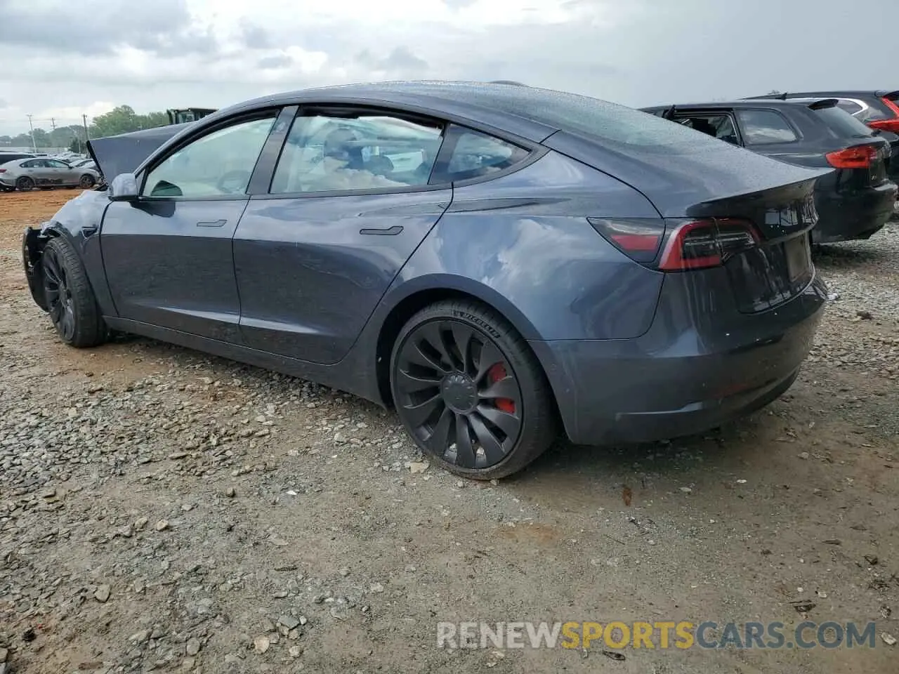 2 fotografías del automóvil dañado 5YJ3E1EC7NF268284 TESLA MODEL 3 2022