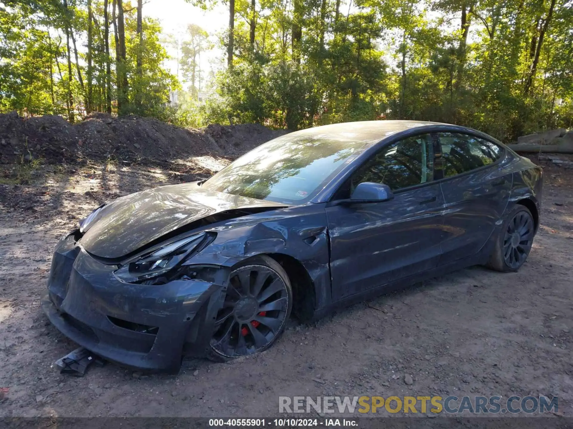 2 fotografías del automóvil dañado 5YJ3E1EC7NF329679 TESLA MODEL 3 2022