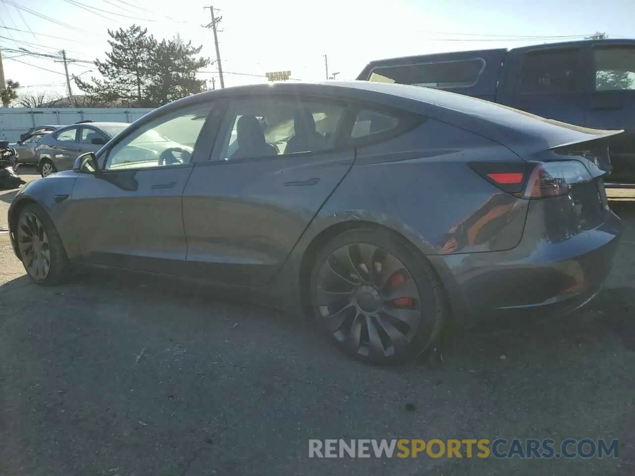 2 fotografías del automóvil dañado 5YJ3E1EC8NF114408 TESLA MODEL 3 2022