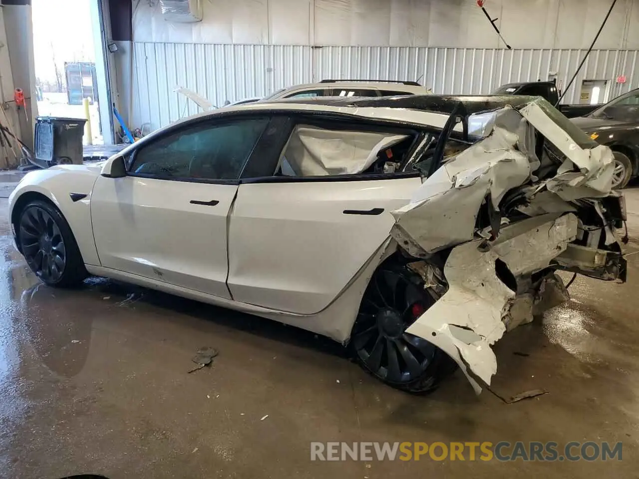 2 fotografías del automóvil dañado 5YJ3E1EC8NF200530 TESLA MODEL 3 2022