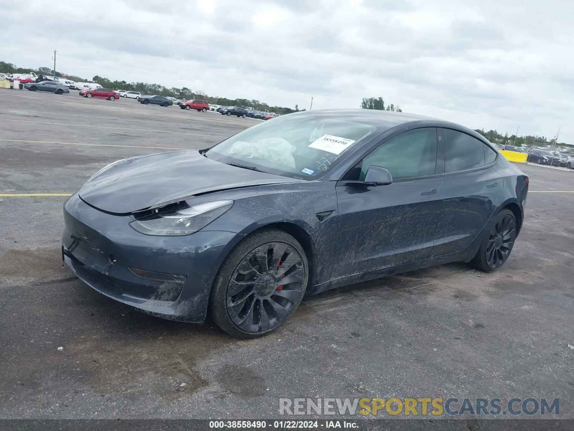 2 fotografías del automóvil dañado 5YJ3E1EC9NF273759 TESLA MODEL 3 2022
