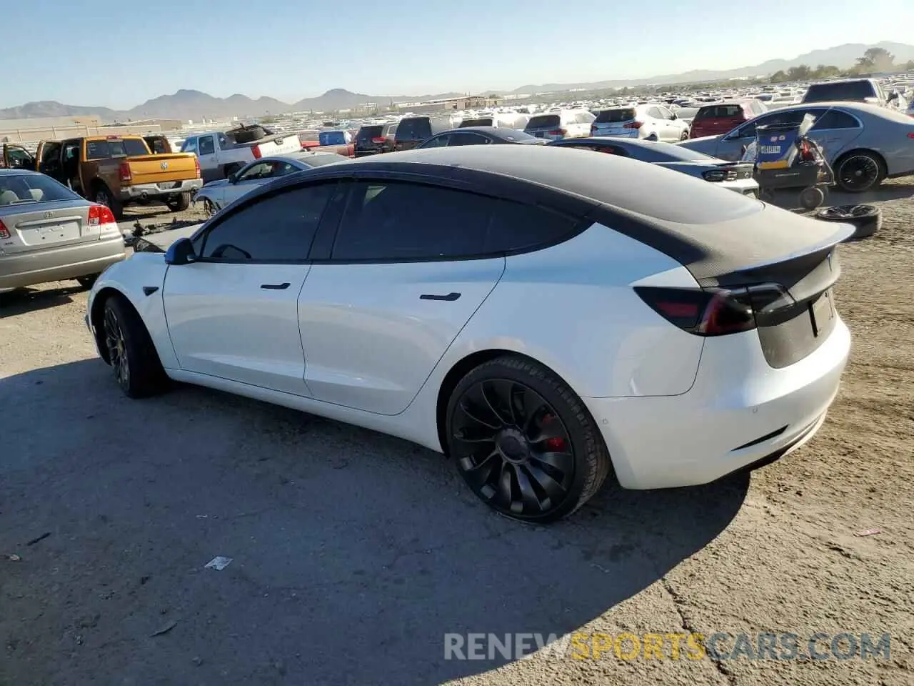 2 fotografías del automóvil dañado 5YJ3E1ECXNF125846 TESLA MODEL 3 2022