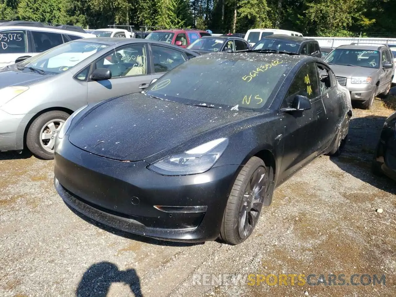 2 fotografías del automóvil dañado 5YJ3E1ECXNF126415 TESLA MODEL 3 2022