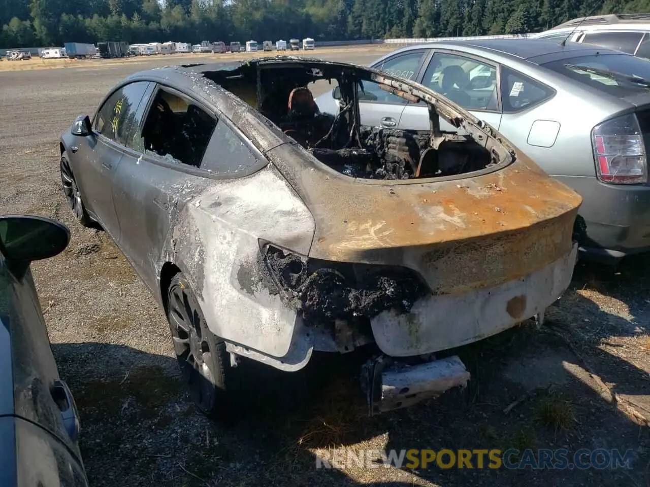 3 fotografías del automóvil dañado 5YJ3E1ECXNF126415 TESLA MODEL 3 2022