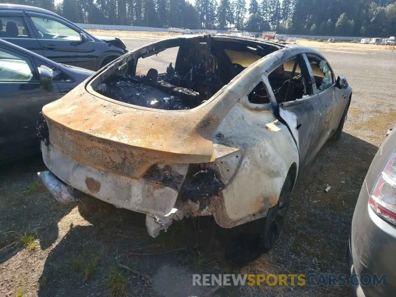 4 fotografías del automóvil dañado 5YJ3E1ECXNF126415 TESLA MODEL 3 2022