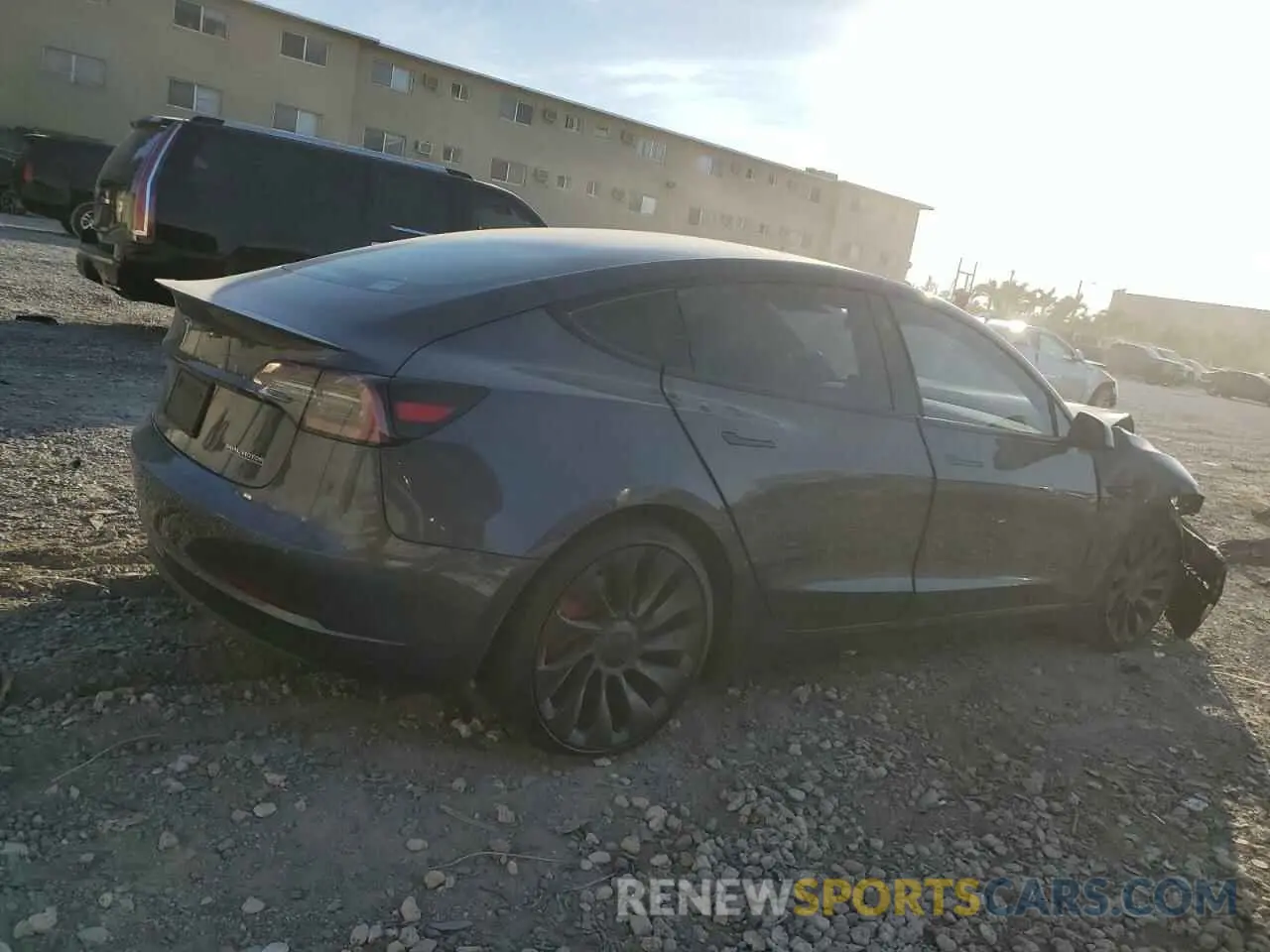 3 fotografías del automóvil dañado 5YJ3E1ECXNF129640 TESLA MODEL 3 2022
