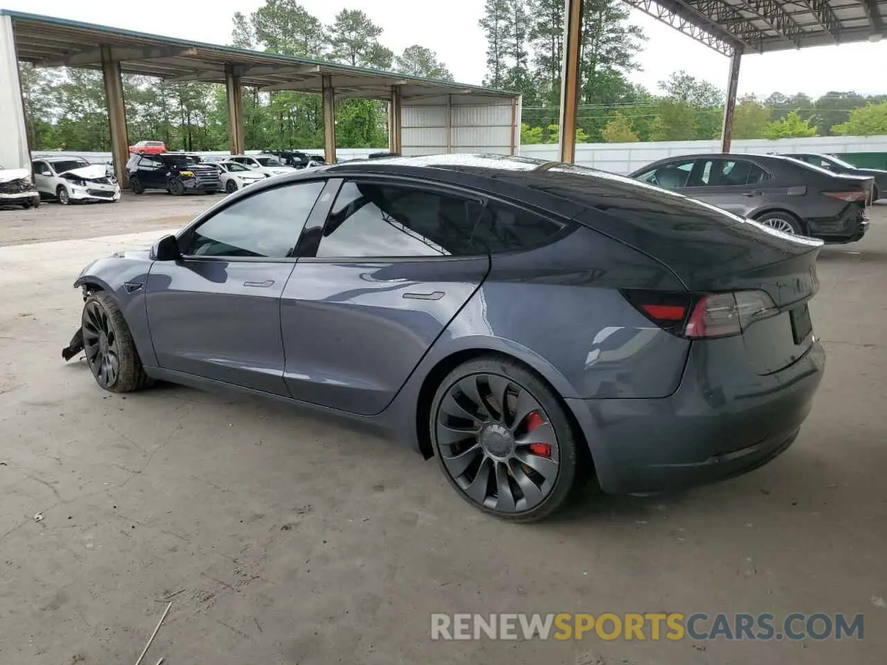 2 fotografías del automóvil dañado 5YJ3E1ECXNF166414 TESLA MODEL 3 2022