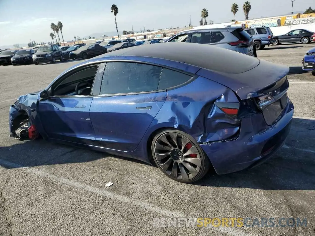 2 fotografías del automóvil dañado 5YJ3E1ECXNF195590 TESLA MODEL 3 2022