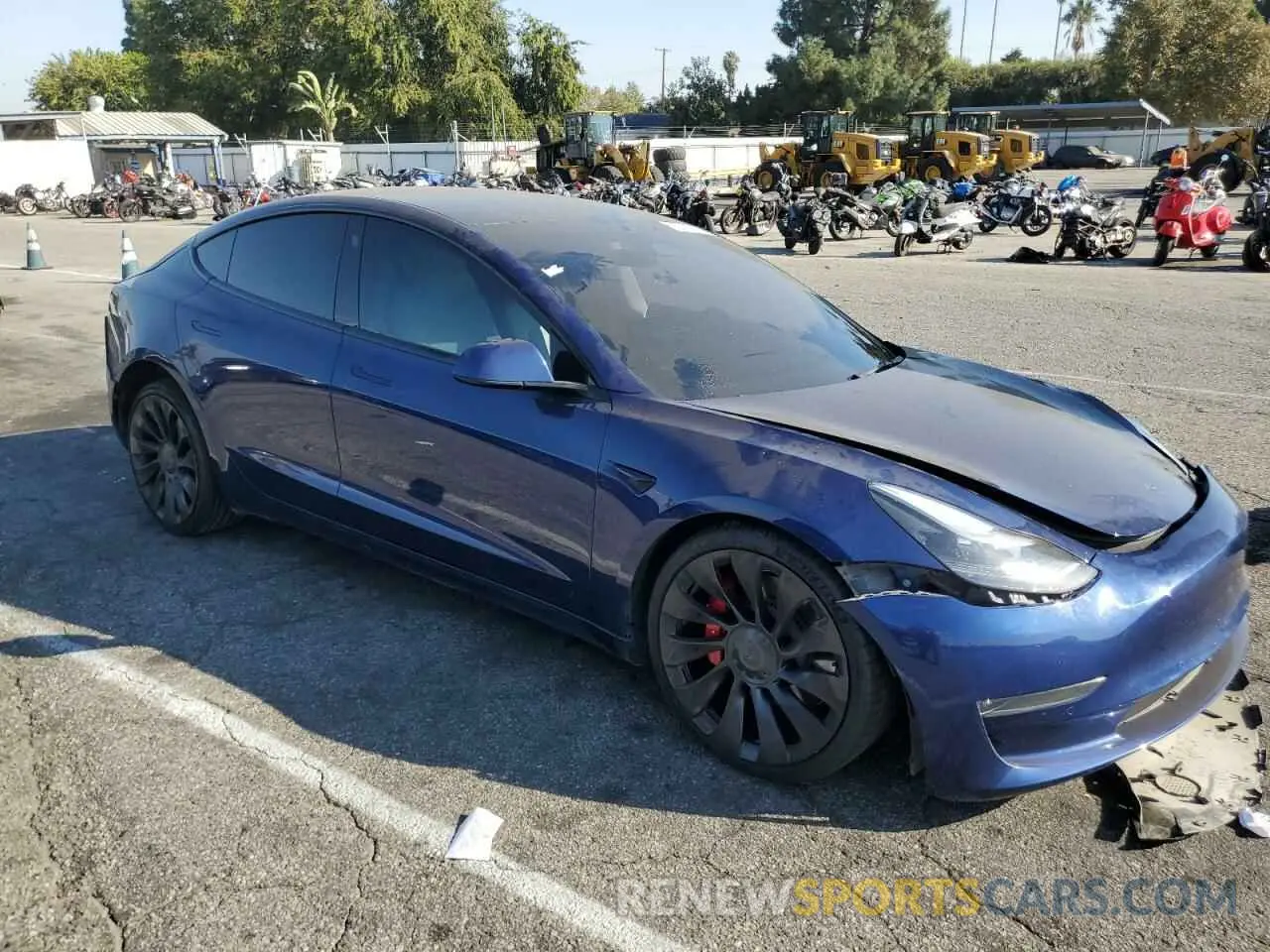 4 fotografías del automóvil dañado 5YJ3E1ECXNF195590 TESLA MODEL 3 2022