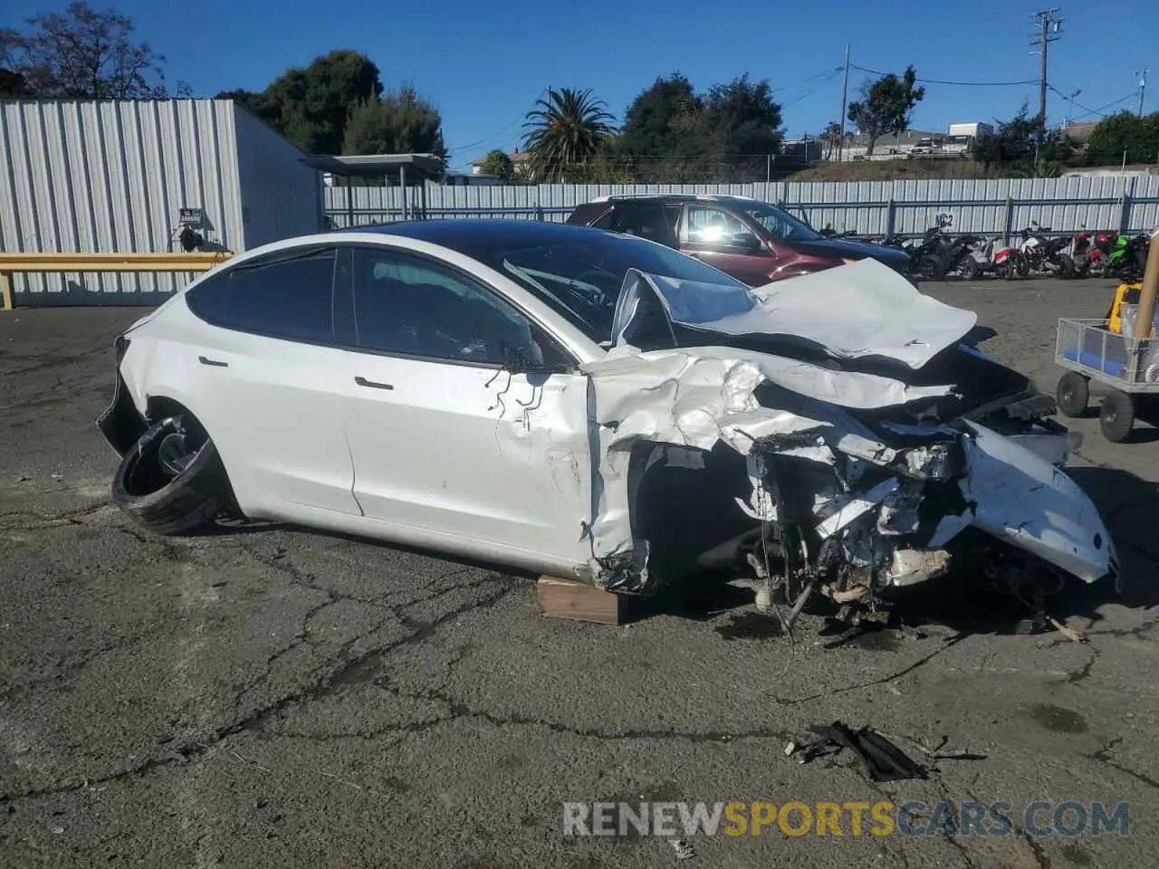 4 fotografías del automóvil dañado 5YJ3E1ECXNF266786 TESLA MODEL 3 2022